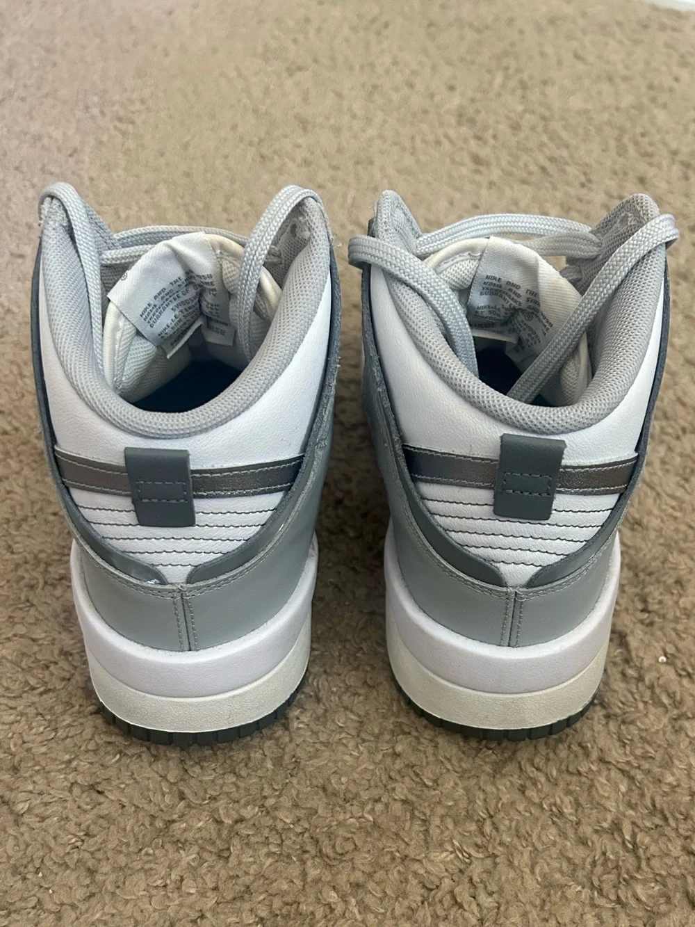 Nike Women’s Gray and White Dunk High Sneakers